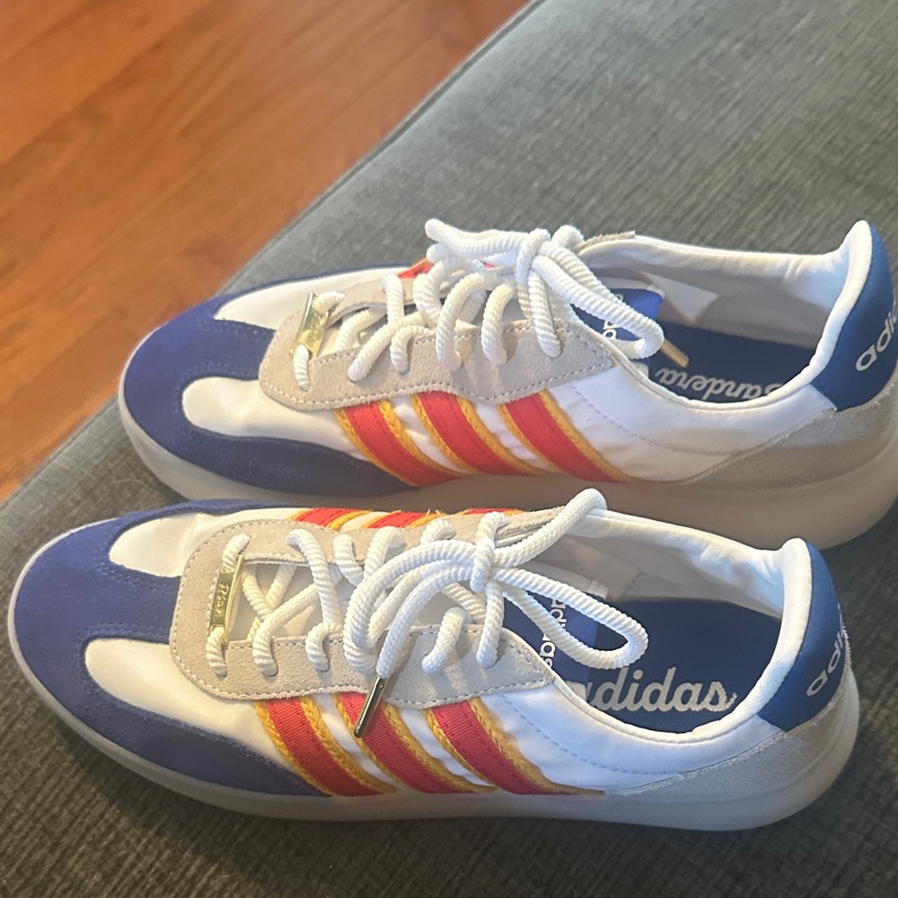 adidas White Sneakers with Blue & Red-Orange Stripe Accents